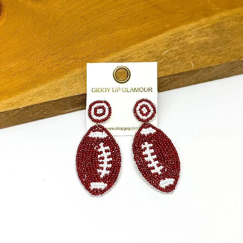 Hoop earrings with diamond-cut surfaces for added sparkle and shine-Football Post Beaded Earrings in Brown and White