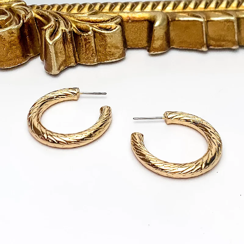 Best hoop earrings with gold-plated finishes for an affordable luxury vibe-Gold Tone Small Twisted Hoop Earrings