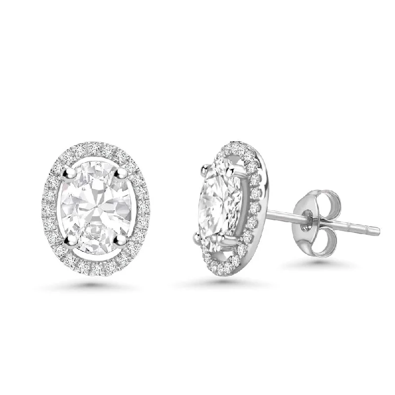 Hoop earrings with infinity loop designs for a continuous and eternal shape-Oval Shape Diamond With Halo Studs Earrings (0.71 ct.) in 14K Gold