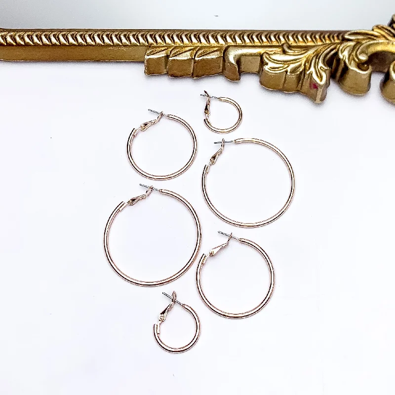 Hoop earrings with leather accents for a sleek and bold combination-Set Of Three | Hoop Earrings in Rose Gold Tone