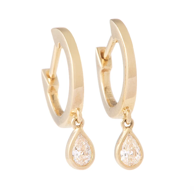 Hoop earrings with diamond-cut surfaces for added sparkle and shine-Solid Gold Huggie with Bezel Set Pear Diamond Dangle