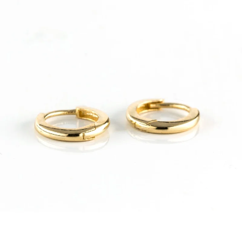 Best hoop earrings with crescent-shaped designs for a bold, moon-inspired style-Solid Gold Petite Huggies