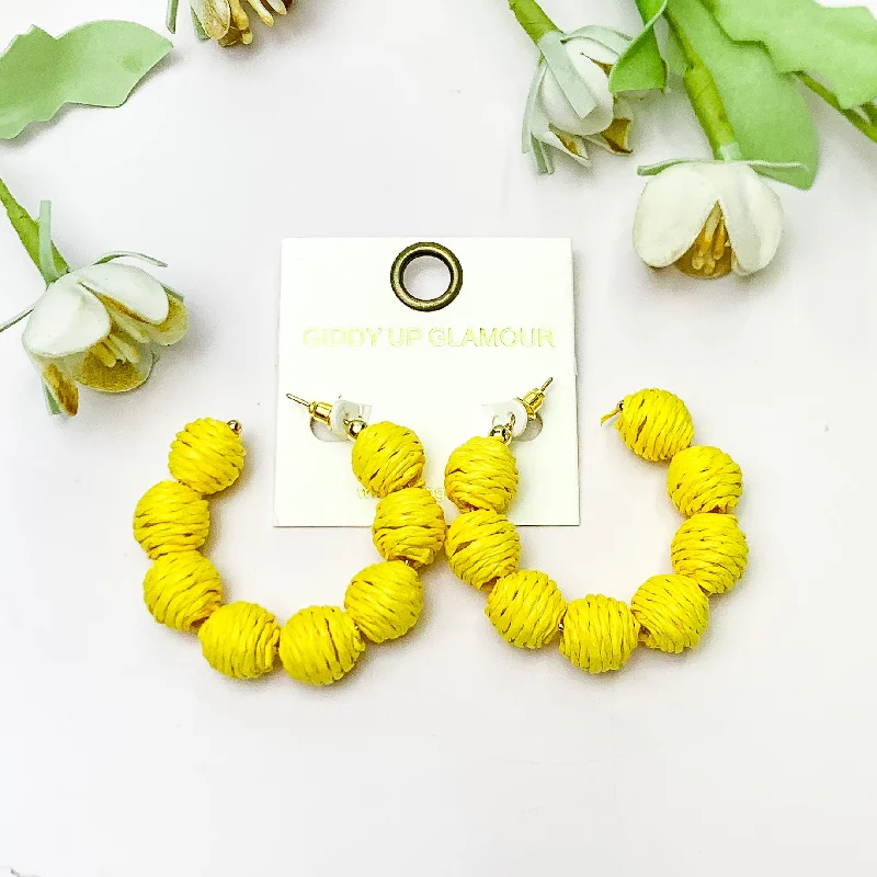 Hoop earrings with heart-shaped frames for a romantic and feminine look-Sorbet Summer Raffia Ball Hoop Earrings in Yellow