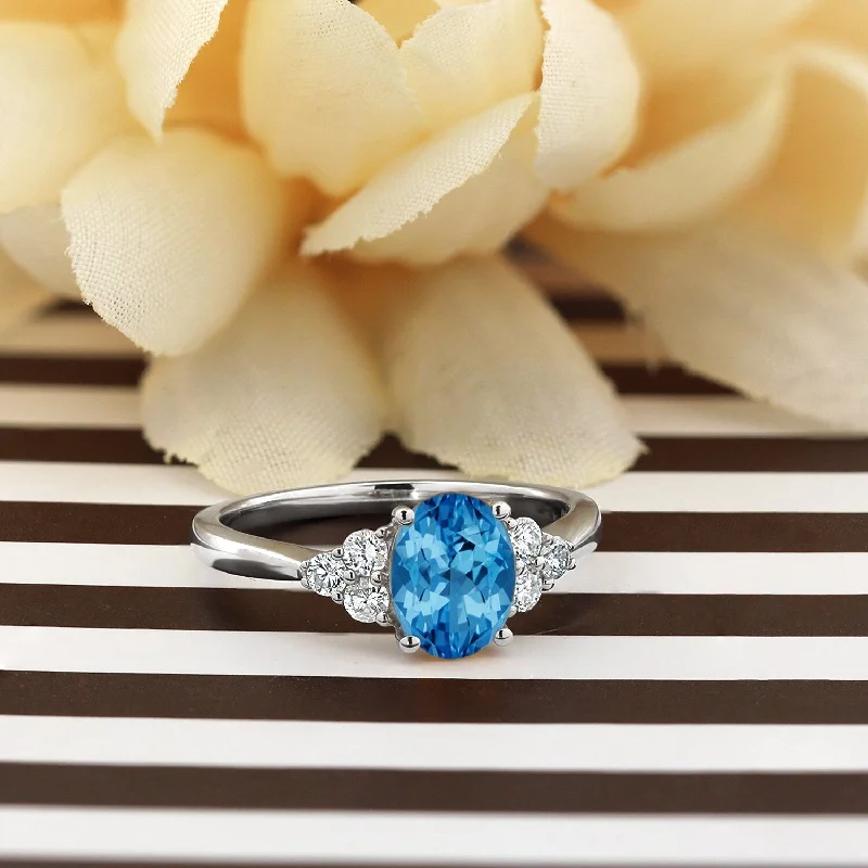 Rings with blue quartz for cool tones -Auriya 1 1/10ct Oval Swiss Blue Topaz and Diamond Engagement Ring 1/4ctw 14k Gold