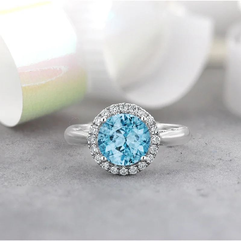 Rings with polished opal for iridescent beauty -Auriya 2 1/2ct Round Sky Blue Topaz and Halo Diamond Engagement Ring 1/4ctw 14k Gold