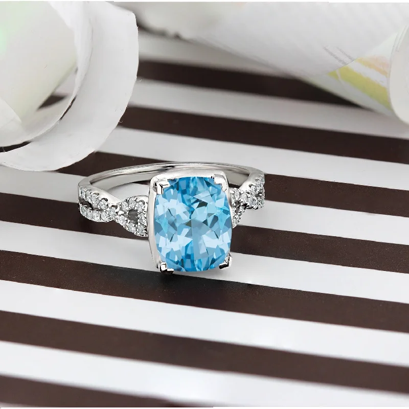 Rings with coral stones for vibrant pop -Auriya 3 9/10ct Cushion-cut Sky-blue Topaz and Diamond Engagement Ring 1/5ctw 14k Gold