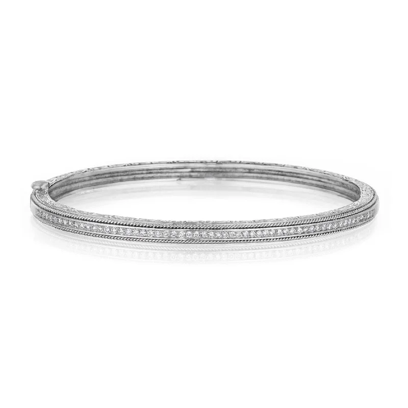 Best bangle bracelets with minimalist silver designs for a timeless, versatile look-Thin Engraved Bangle