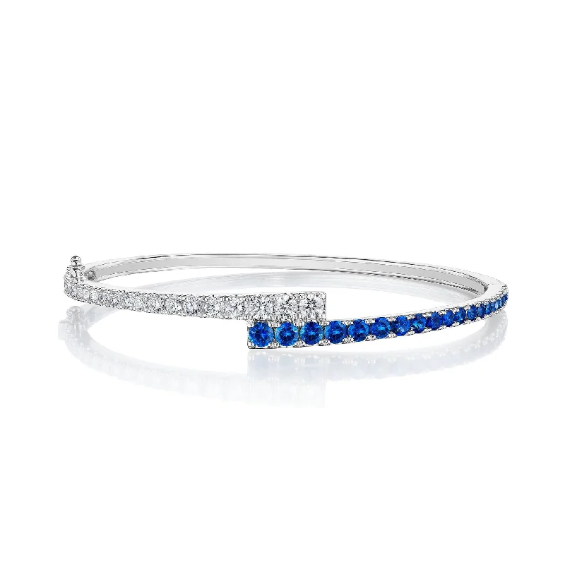 Best bangle bracelets with unique stone inlays for a one-of-a-kind accessory-Blue Sapphire Bypass Bangle