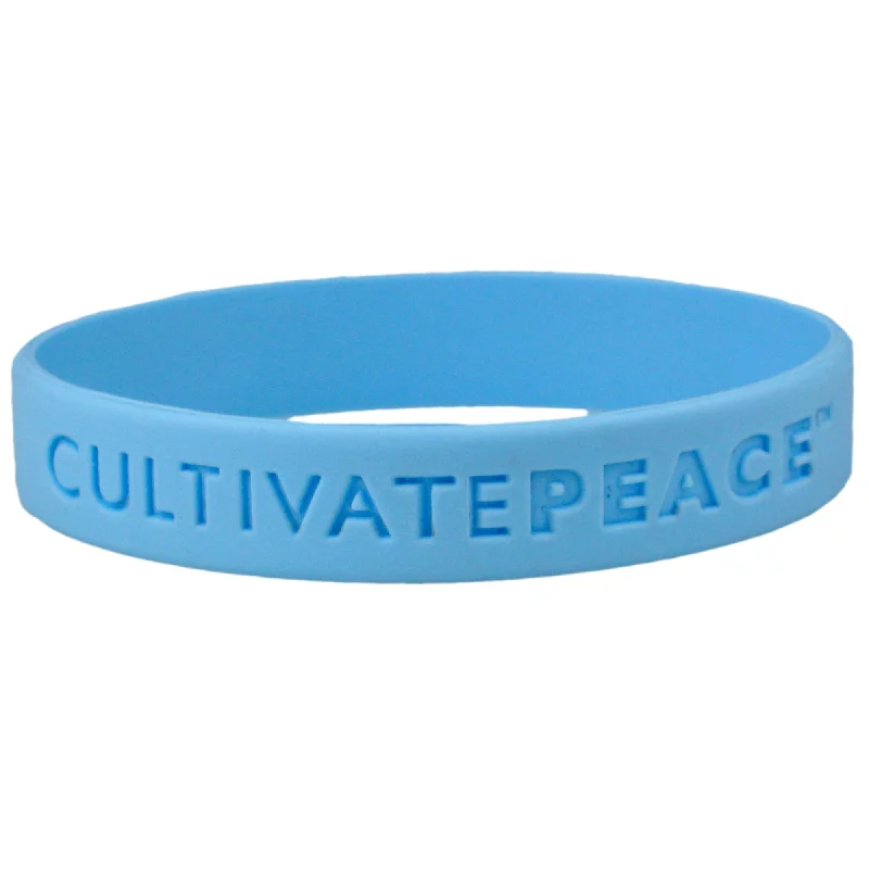 Best bangle bracelets with engraved floral patterns for a delicate and elegant design-Hunger Site Cultivate Peace Silicone Bracelet