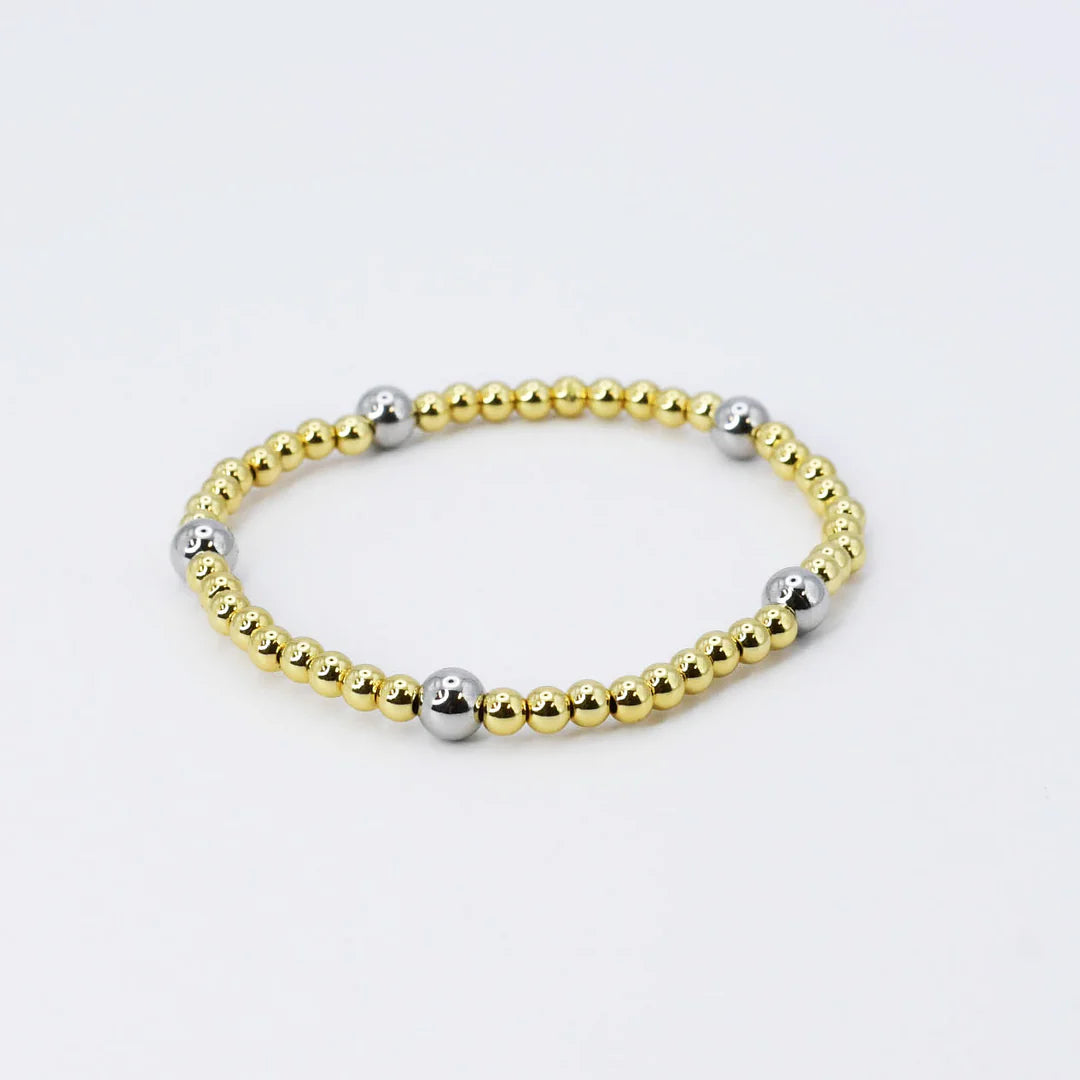 Best bangle bracelets with clear acrylic for a modern, transparent design-Gold Beaded Silver Accent Ball Bracelet by Treasure Jewels