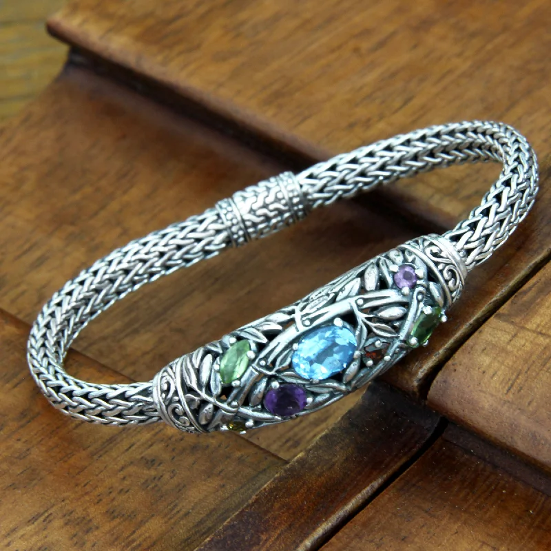 Best bangle bracelets with cubic zirconia inlays for affordable elegance and sparkle-Bamboo Blossoms Blue topaz and peridot braided bracelet