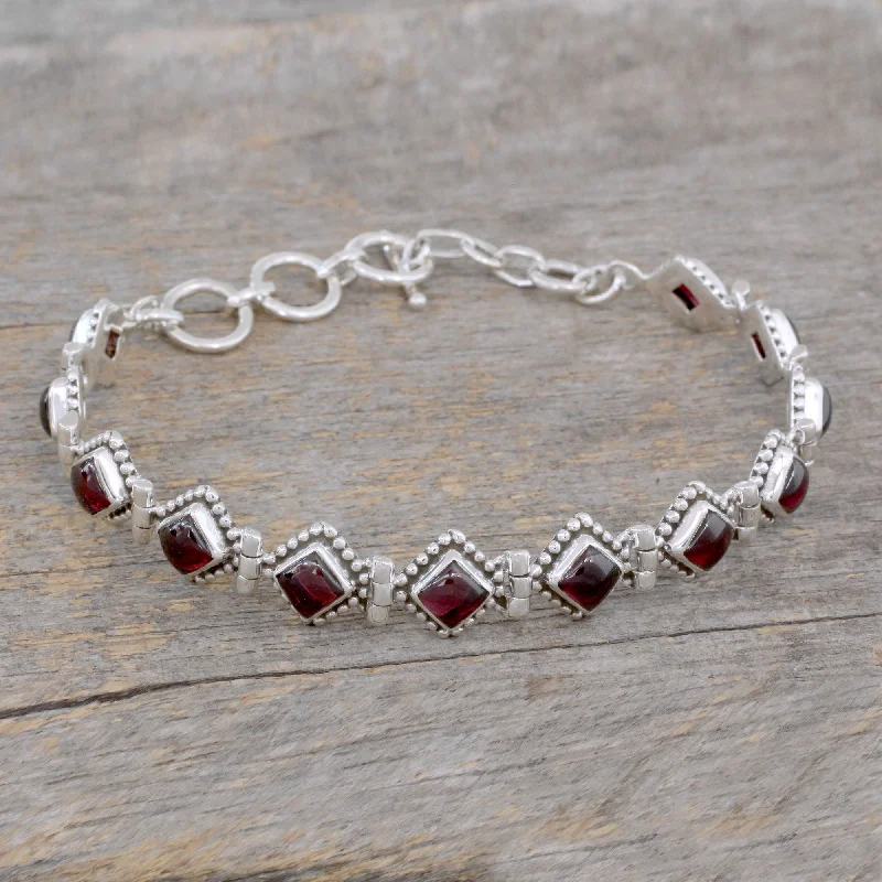 Stylish bangle bracelets with gemstone accents for a chic and modern look-Deep Red Diamonds Silver & Garnet Tennis Bracelet