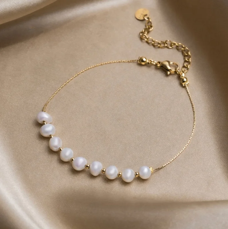 Minimalist bangle bracelets with a thin profile for a sleek and subtle appearance-Eva Freshwater Pearl Bracelet