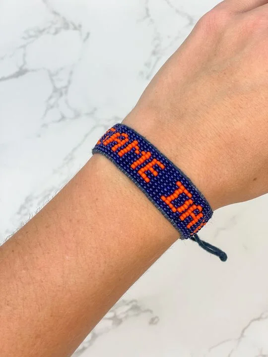 Bangle bracelets with polished marble inlays for a chic and trendy appearance-'Game Day' Beaded Adjustable Bracelet - Navy & Orange