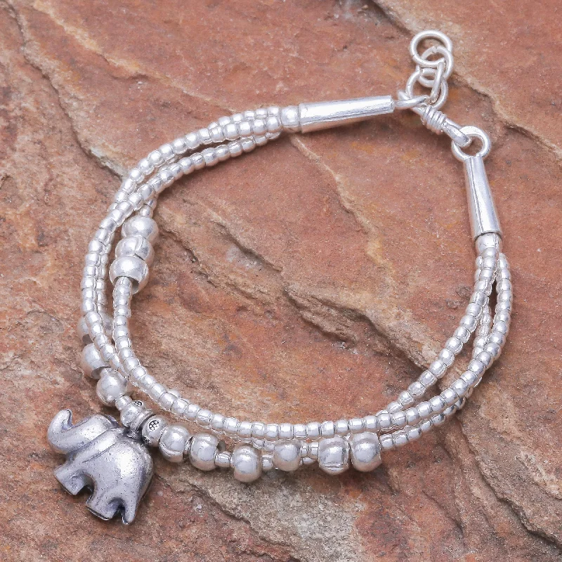 Best bangle bracelets for women with elegant gold designs for every occasion-Little Karen Elephant Thai Karen Hill Tribe Silver Elephant Bracelet