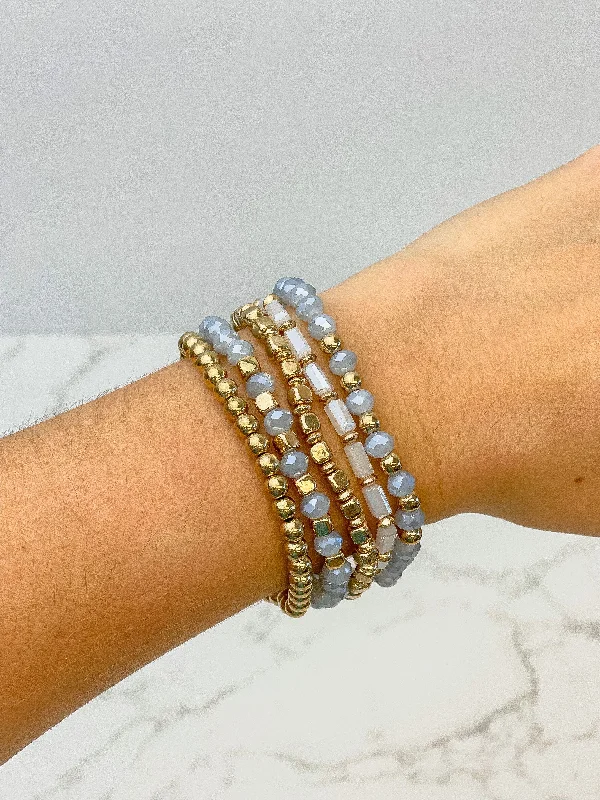 Sleek bangle bracelets with polished titanium for a modern and lightweight option-Multi Strand Gray & Gold Bracelet Stack