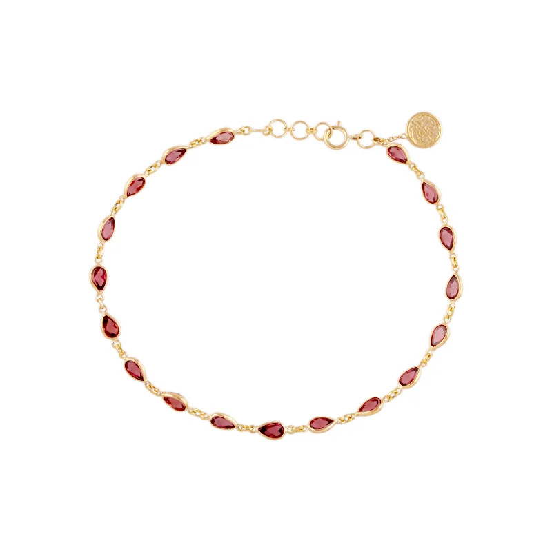 Best bangle bracelets with engraved floral patterns for a delicate and elegant design-Rhodolite Pear Shape Bracelet In 18K Yellow Gold