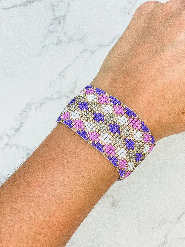 Best bangle bracelets with customizable charms for a personalized, unique piece-Seed Bead Stretch Bracelet - Purple