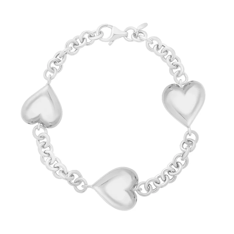 Best bangle bracelets with heart-shaped charms for a romantic and sweet touch-Silver Puffed Triple Heart Bracelet