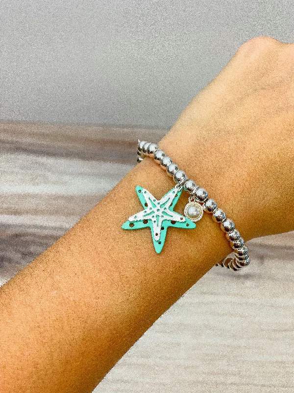 Best bangle bracelets with vibrant stones for a rich and colorful appearance-Starfish Charm Stretch Bracelet