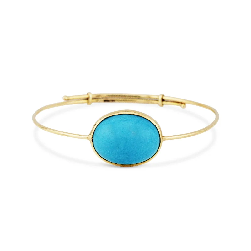 Wide bangle bracelets with animal print designs for a bold and exotic look-Turquoise Oval Bangle In 18K Yellow Gold